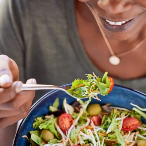 women eating a salad