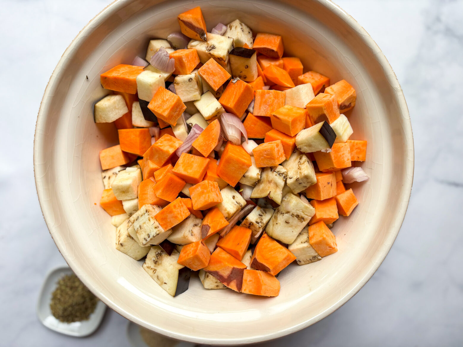 Eggplant cassrole preparation in a bowl.