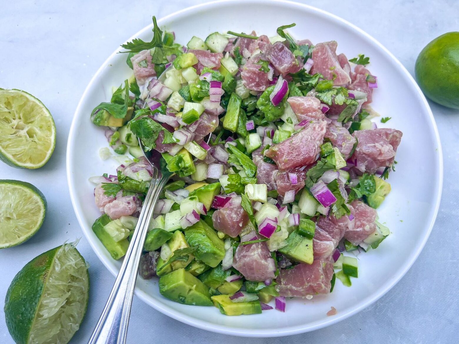 ginger tuna ceviche finished with a spoon