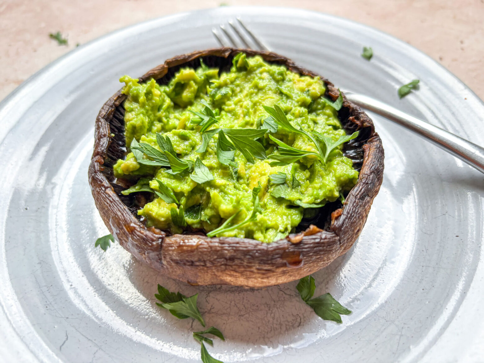 Grilled portobello mushrooms finished and plated.
