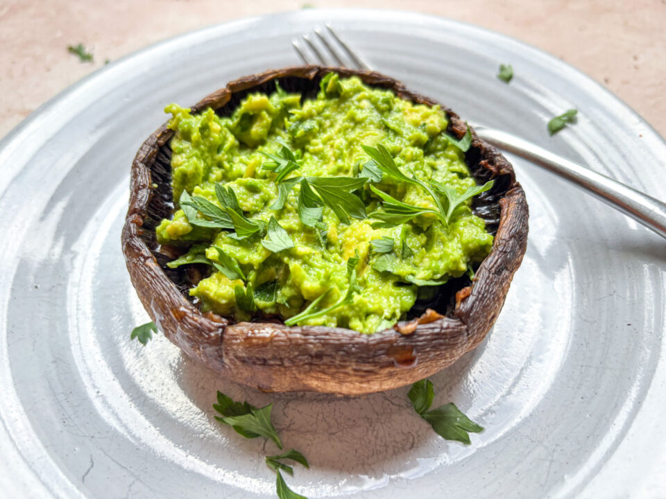 Grilled portobello mushrooms finished and plated.