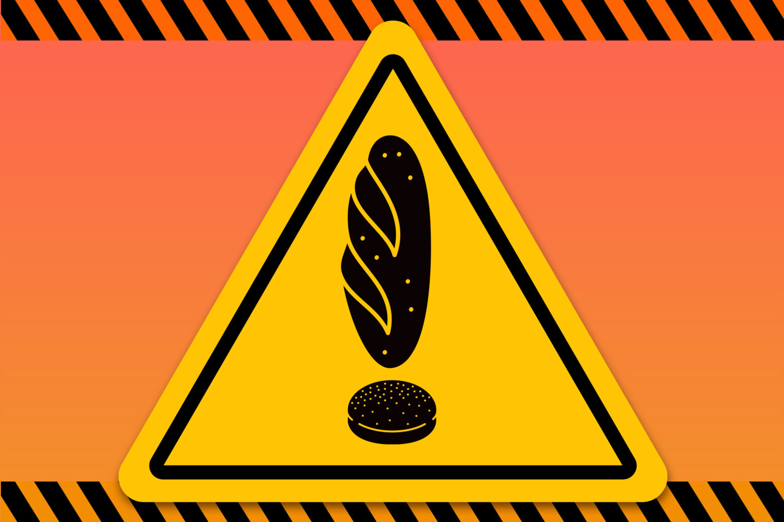 A triangular caution sign with the exclamation point made out of bread products