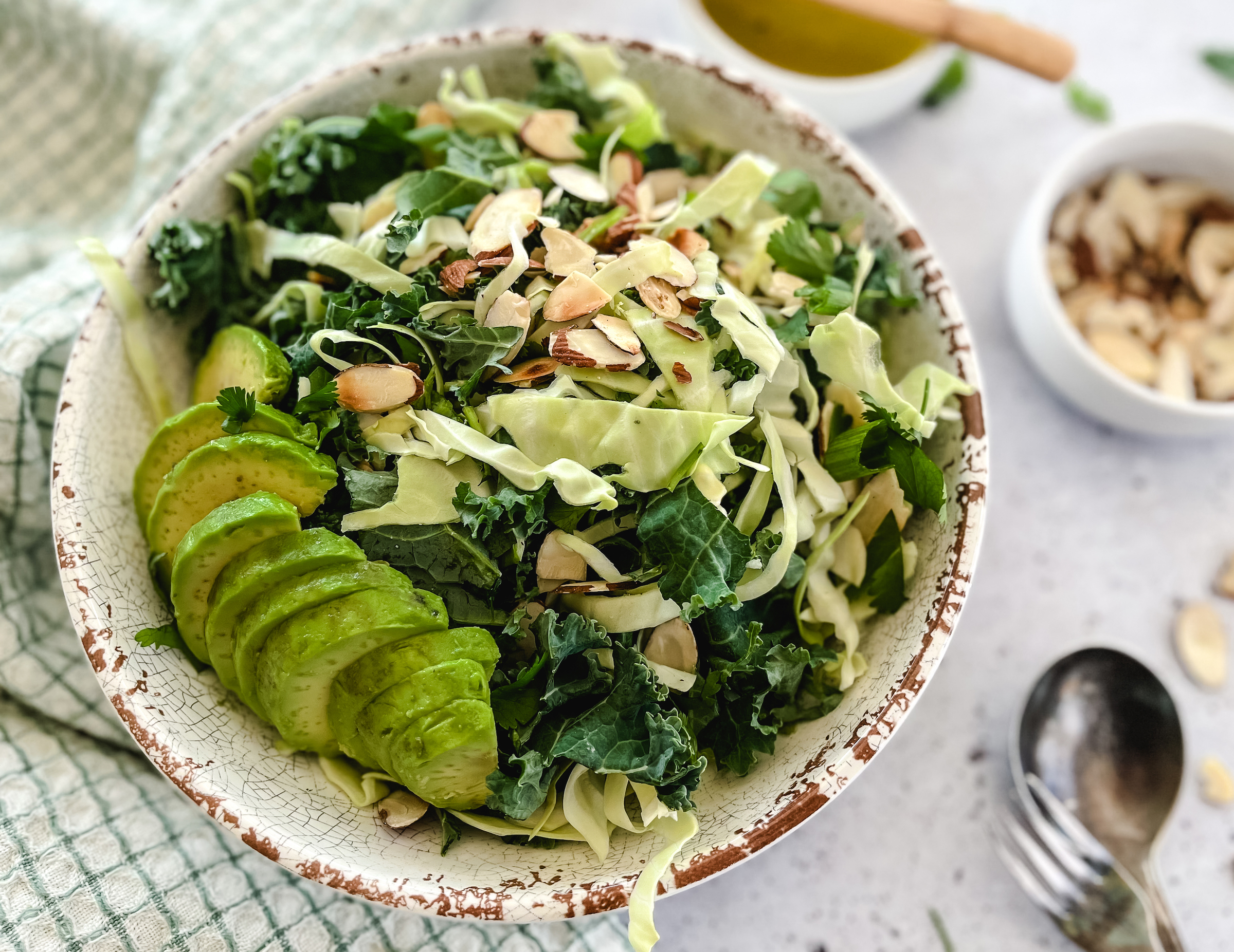 A finished Almond Lime Kale Salad in a bowl