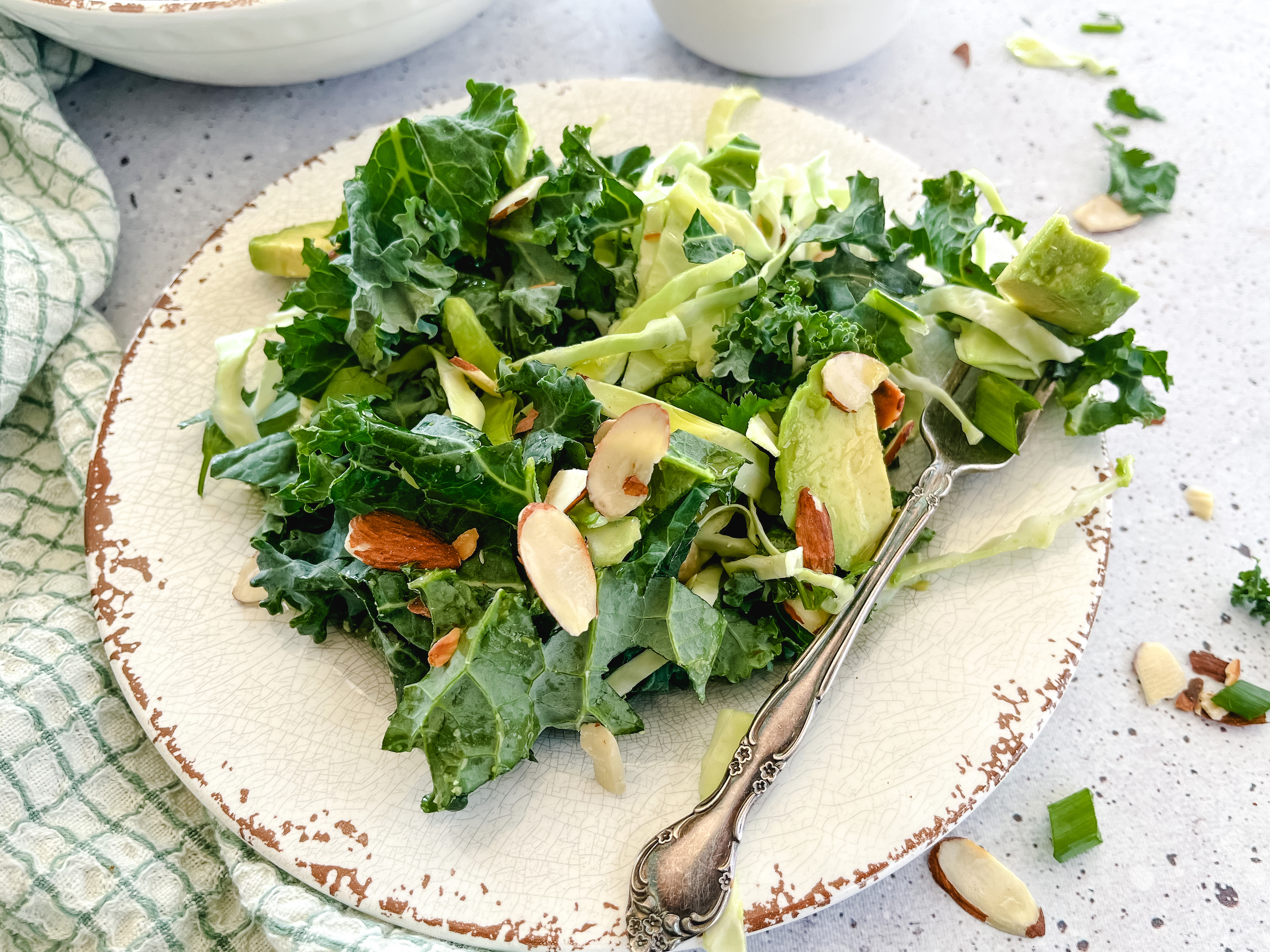 Almond Lime Kale Salad plated and finished