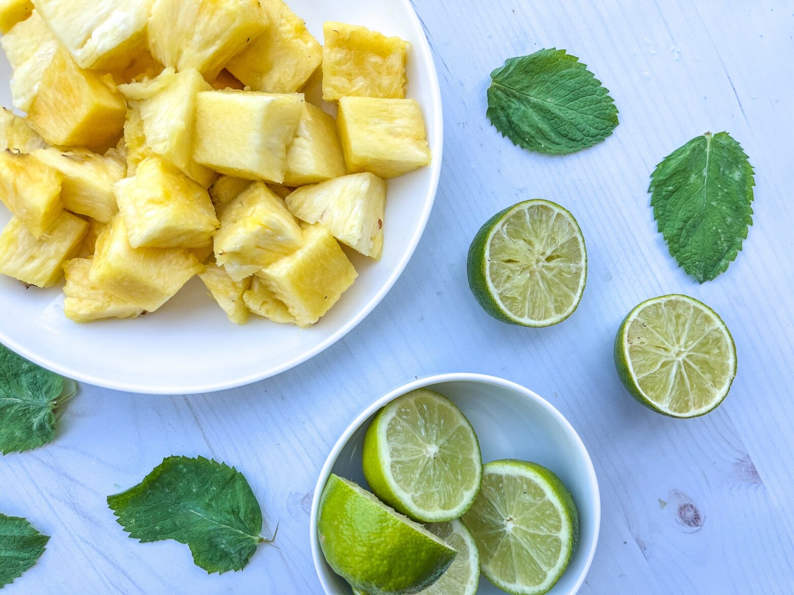 Preparation for a sparkling mojito mocktail.