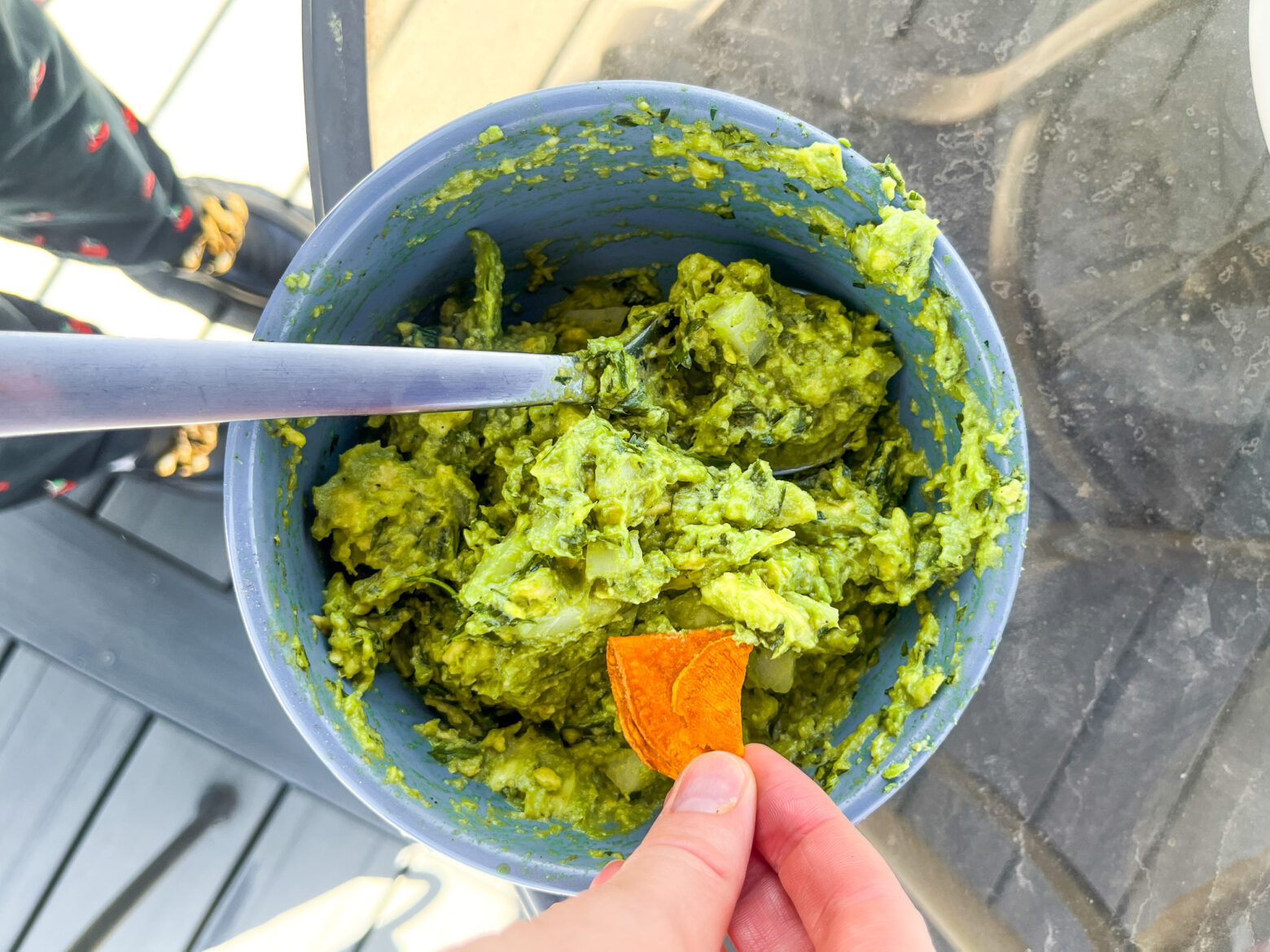 Bowl of guacamole with a Jackson's Chip in the shot.