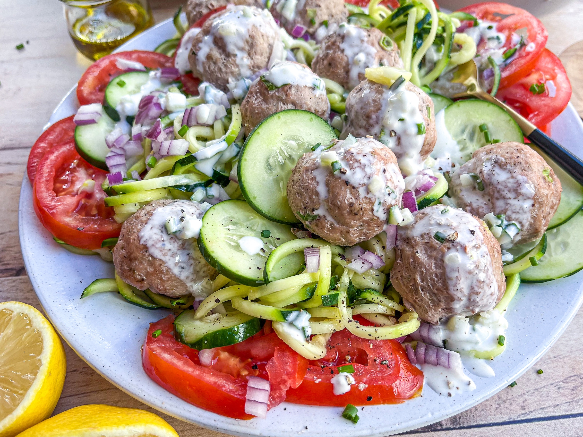 Greek meatballs with sauce close up.