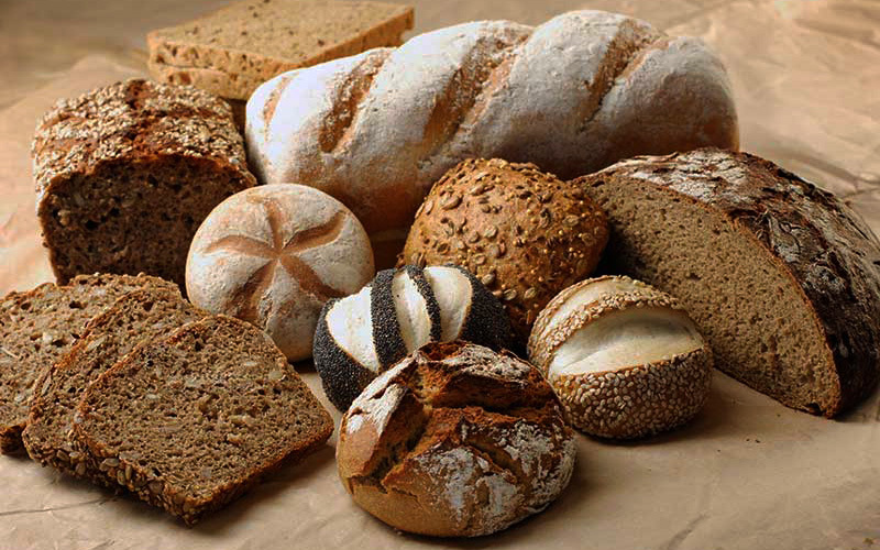 Several loaves of bread in a pile