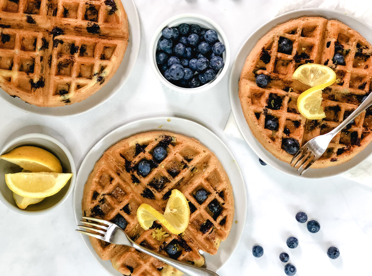 Lemon blueberry waffles on plates