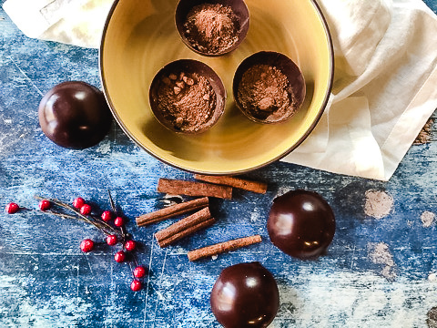 Half hot chocolate bombs filled with hot chocolate mix