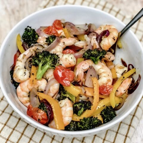 Sheet pan shrimp and vegetables finished in a bowl