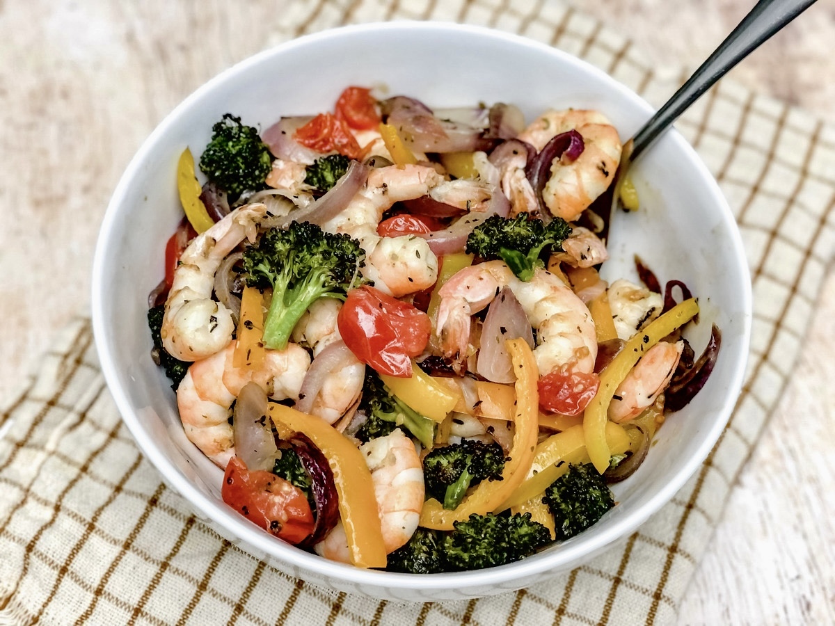 Sheet pan shrimp and vegetables finished in a bowl