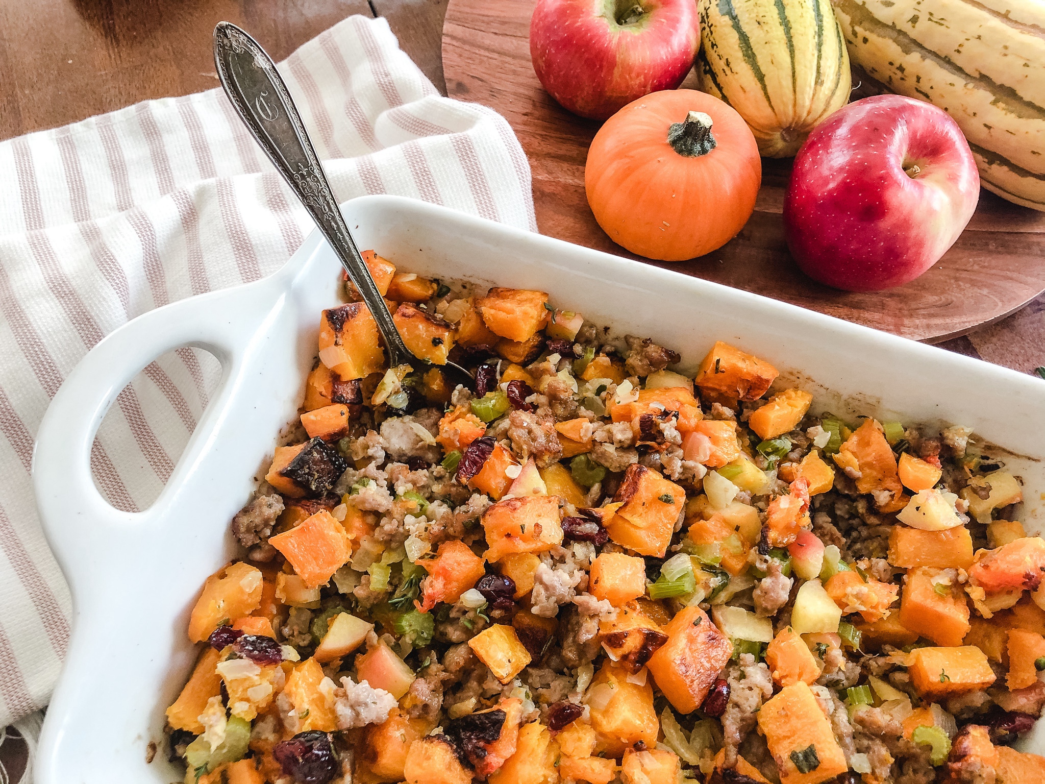 Thanksgiving stuffing with a serving spoon.
