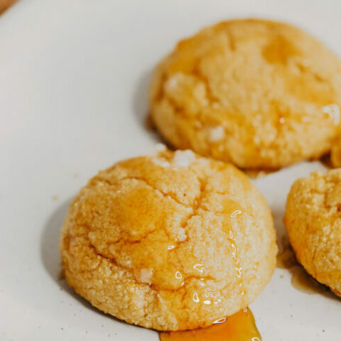 Sweet potato biscuits with honey on a plate