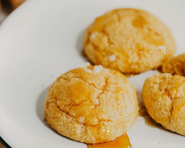 Sweet potato biscuits with honey on a plate
