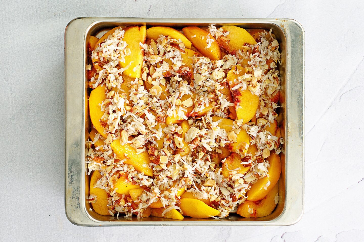 Peach crumble in a baking dish