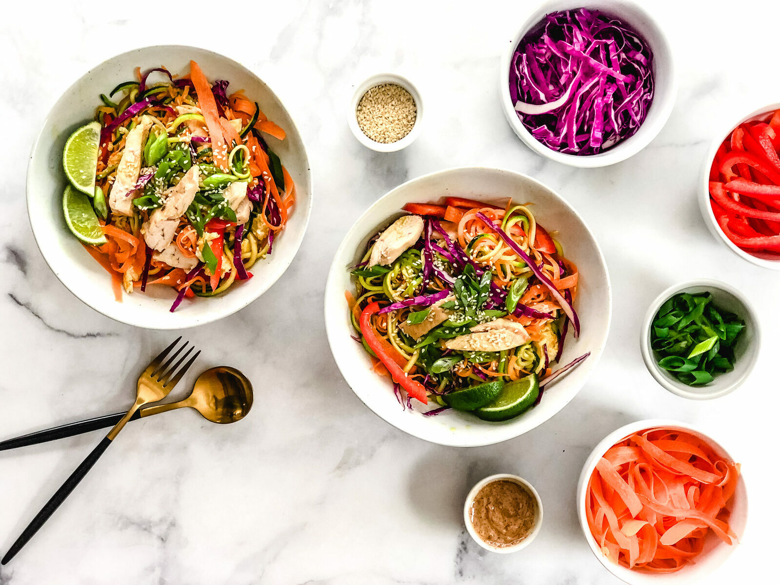 Paleo-Pad-Thai-in-Bowls-with-Ingredients-Surrounding-Birdseye-View-Finished