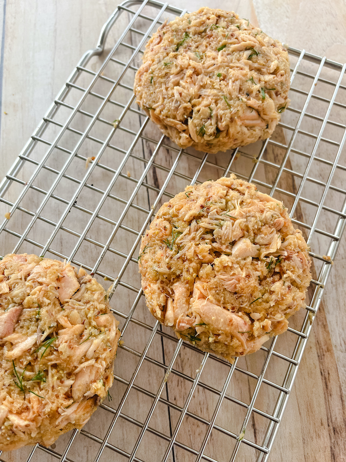 salmon patties on a wire rack