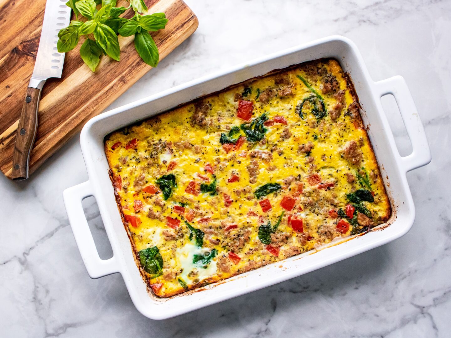 Cooked protein-packed breakfast casserole in a baking dish