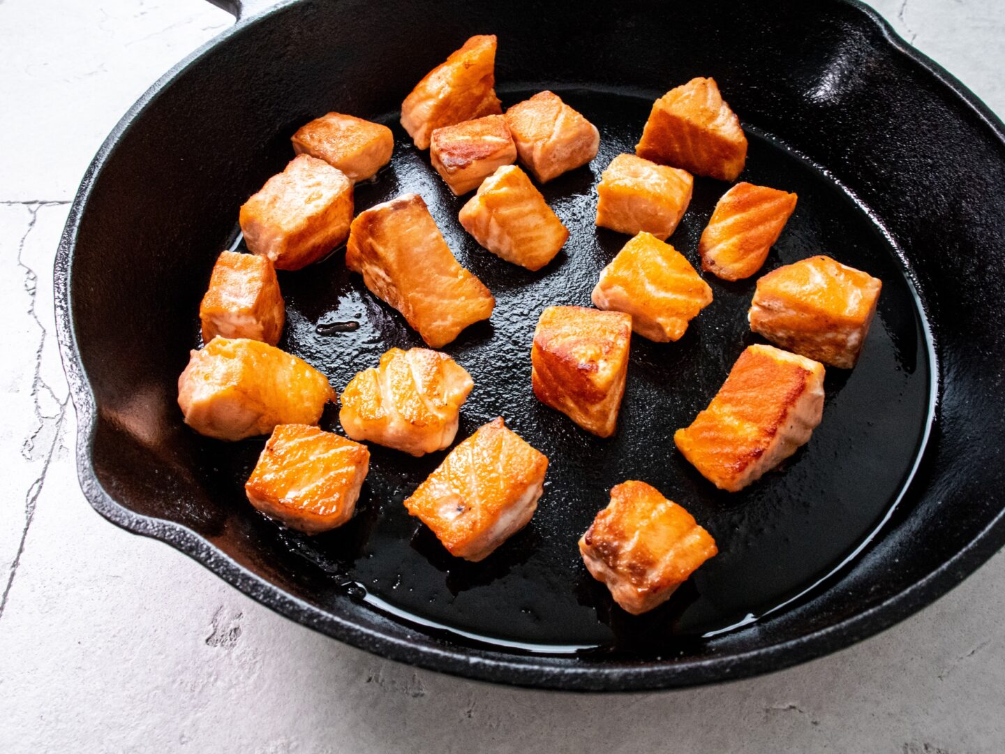 Seared salmon in a cast-iron skillet