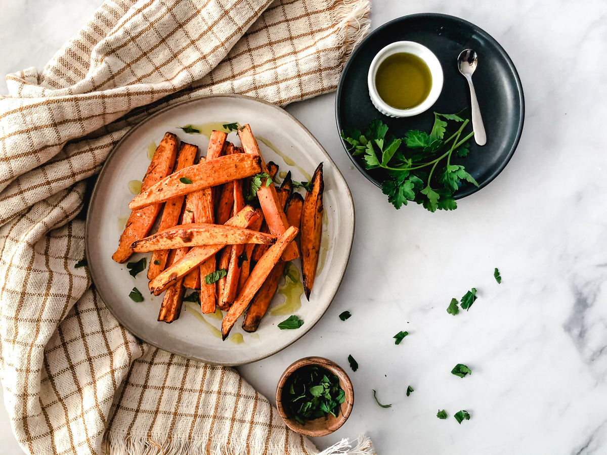 Air Fryer Sweet Potato Fries on a plate with toppings