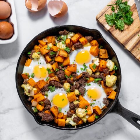 Above shot of sweet potato and bison hash in a skillet