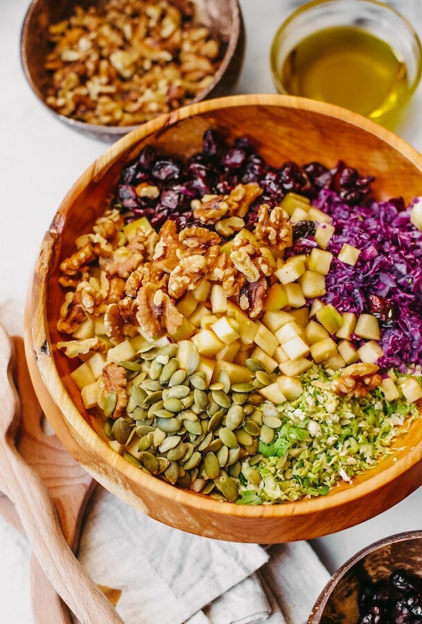 Brussels slaw ingredients in a bowl before mixing