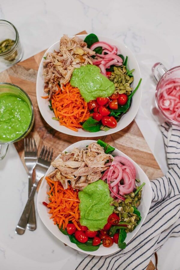 Two Fiesta Chicken Salad bowls on a table
