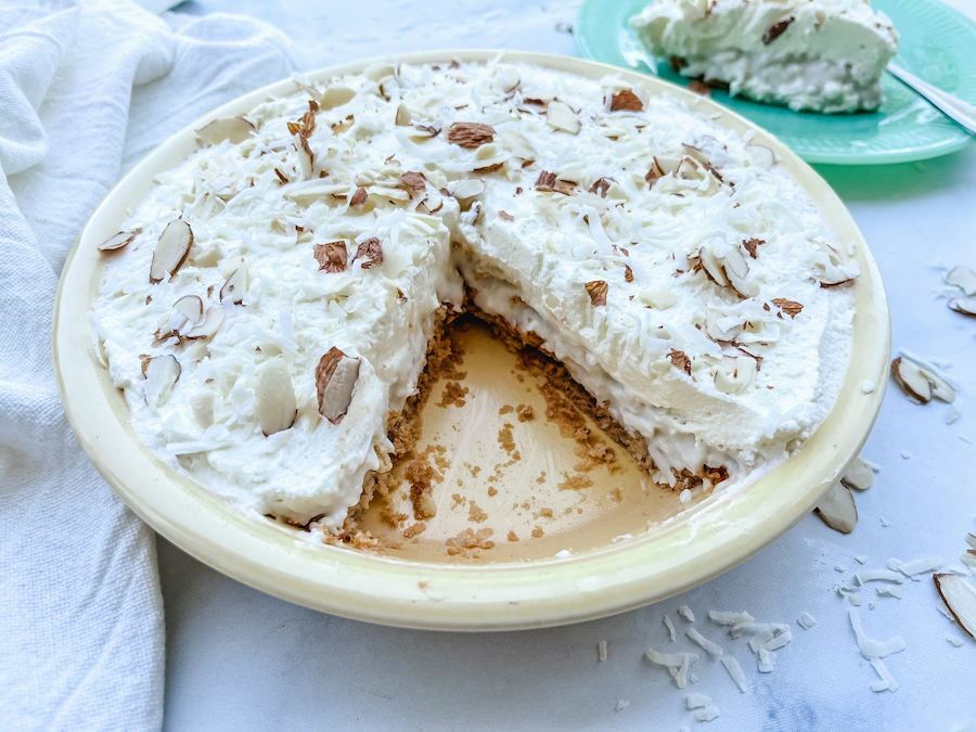 coconut cream pie slice taken out