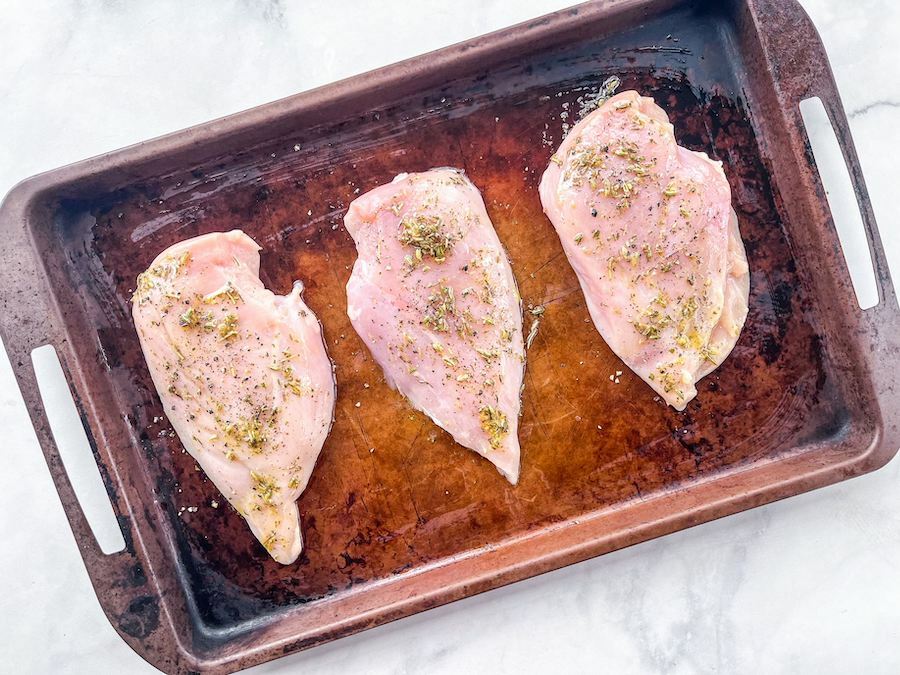 Sheet pan lemon chicken before baking