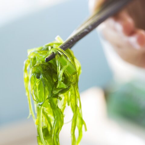 Seaweed held in chopsticks