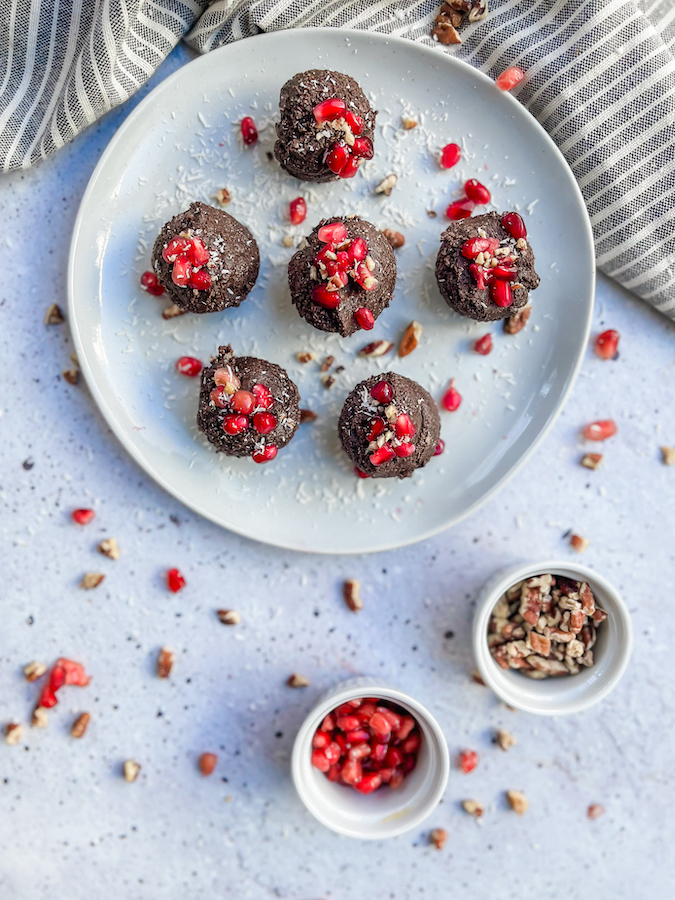 Above shot of Pomegranate Cocoa Treats arranged evenly on a plate