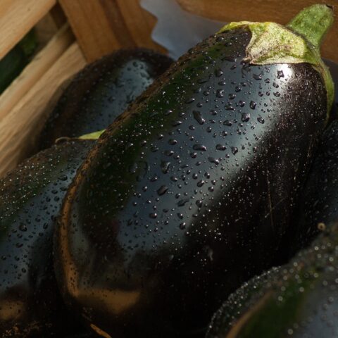 Eggplants in a wooden box