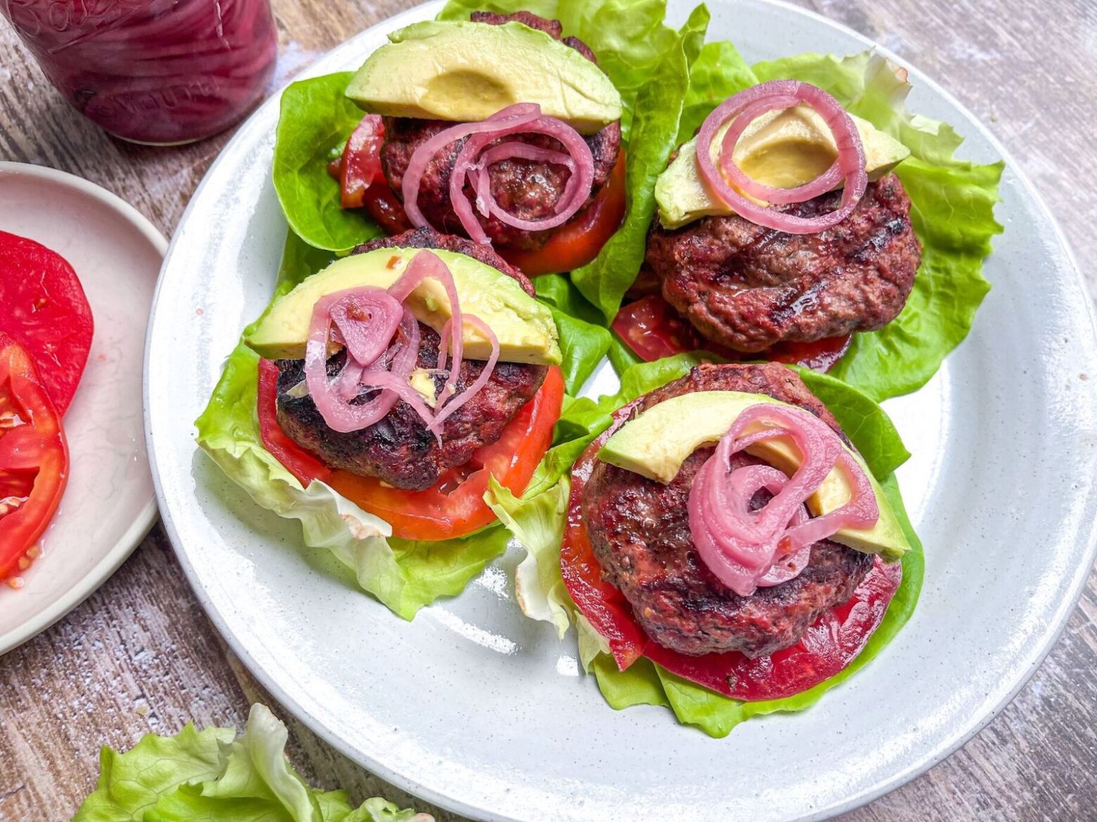 burger plated with toppings