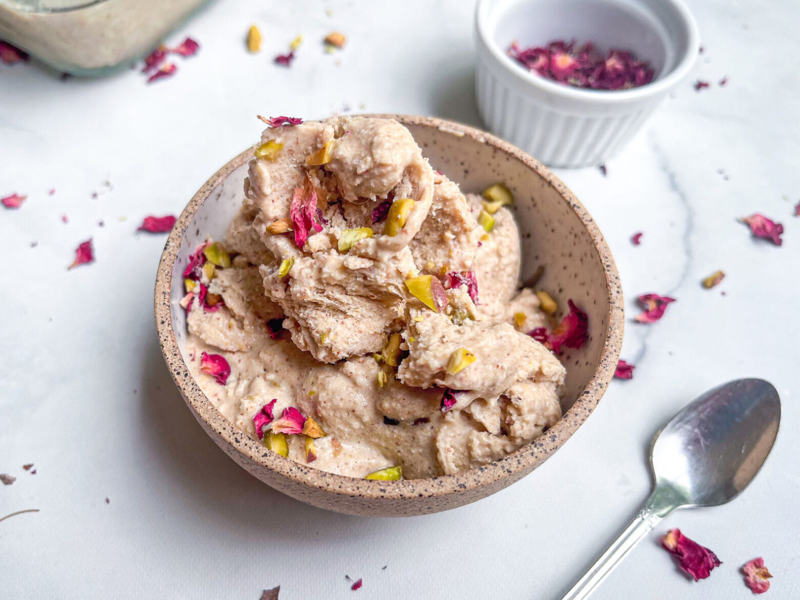 rosewater and pistacho icecream in a bowl