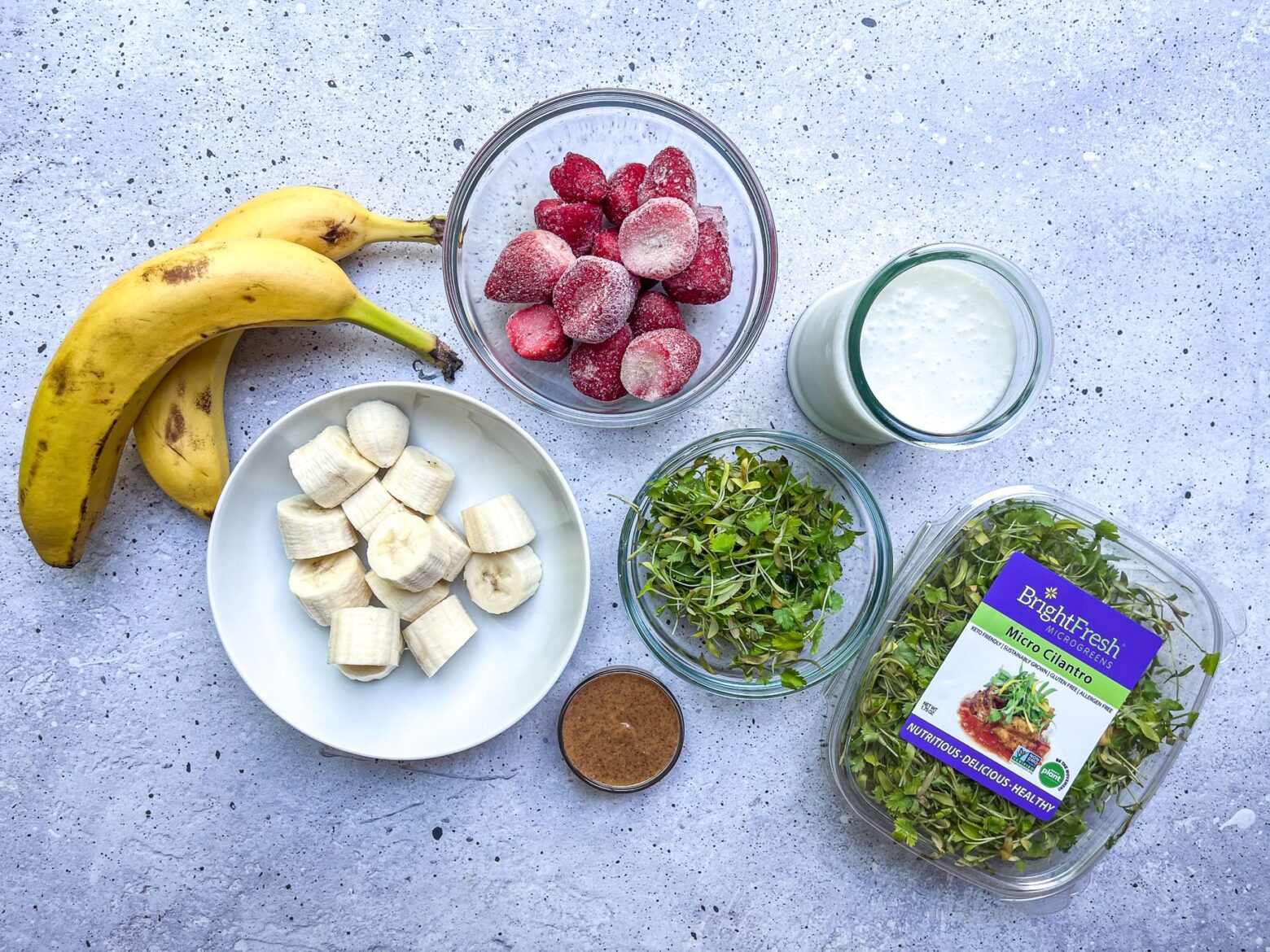 strawberry banana smoothie ingredients with BrightFresh microgreens