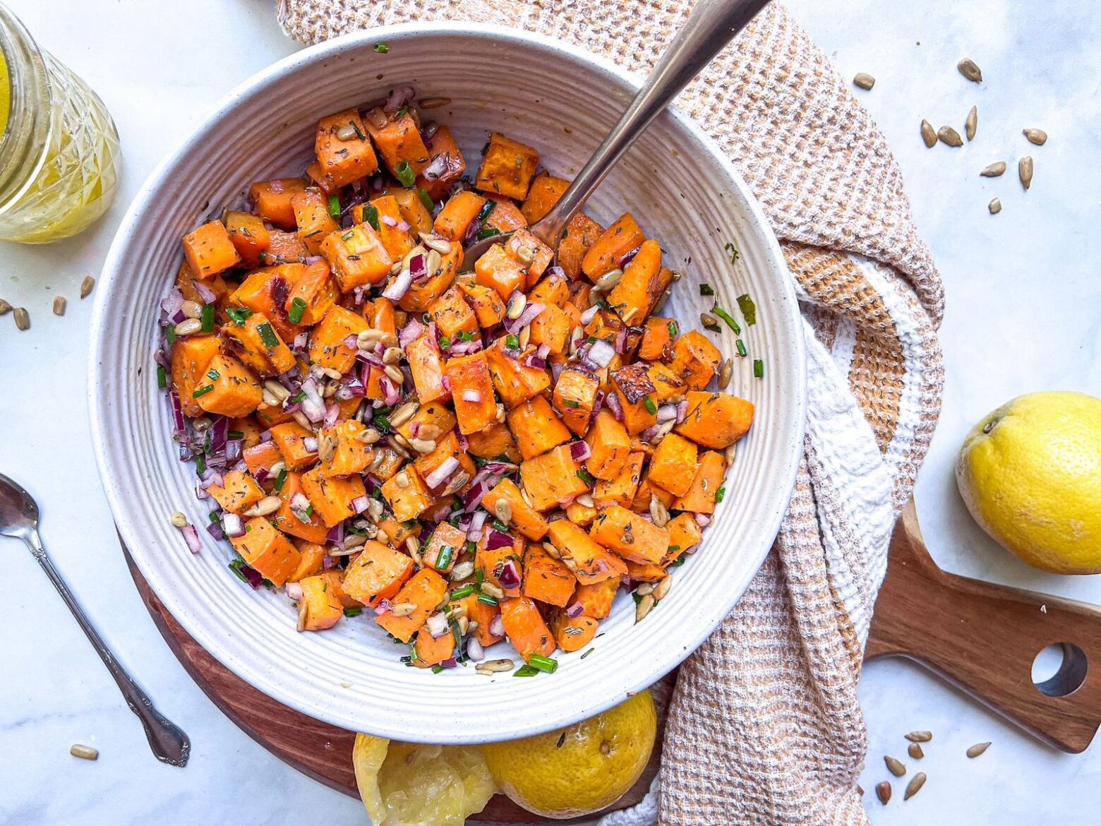 sweet potato salad on a wooden board