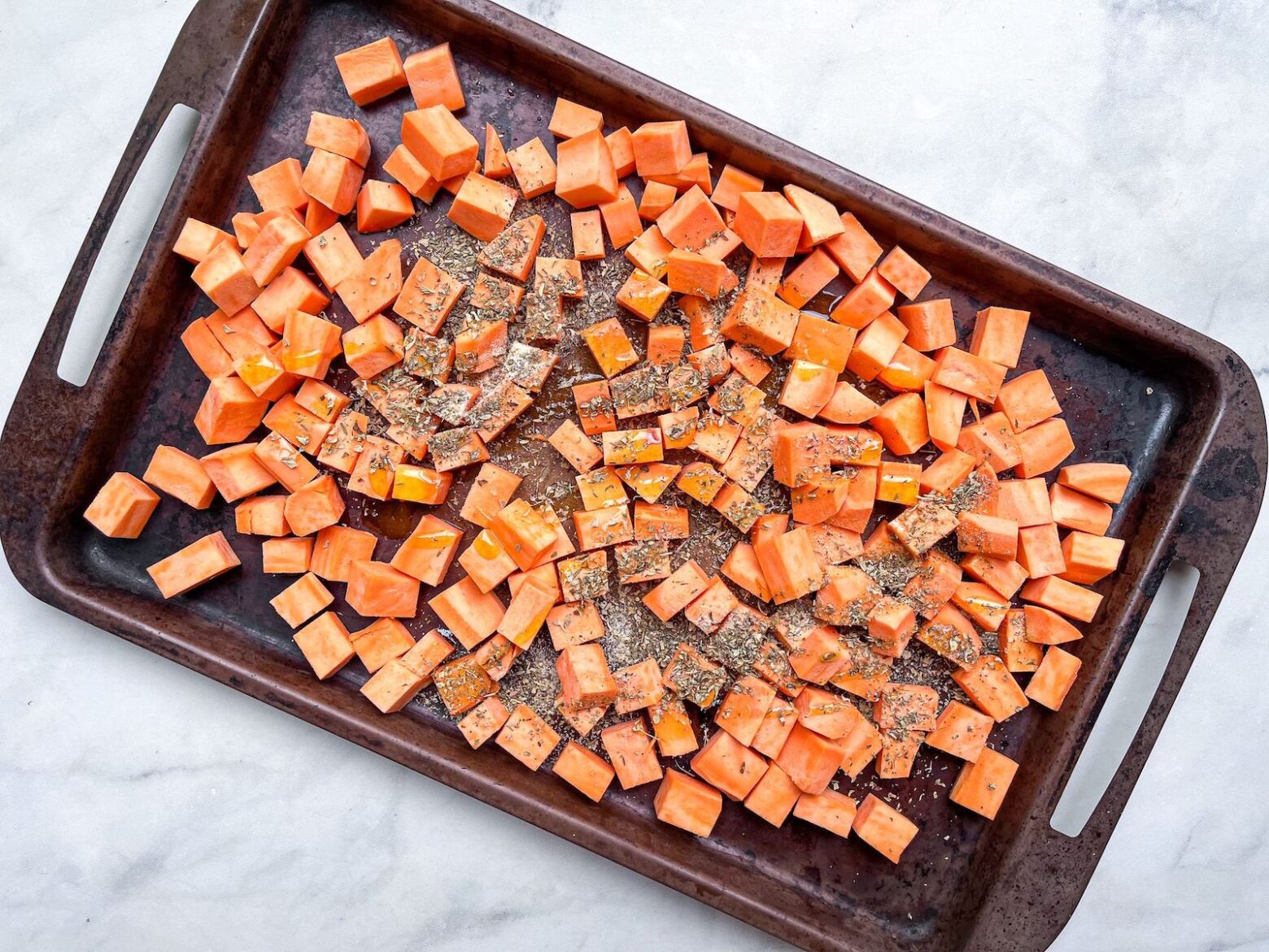 sweet potatoes on baking tray