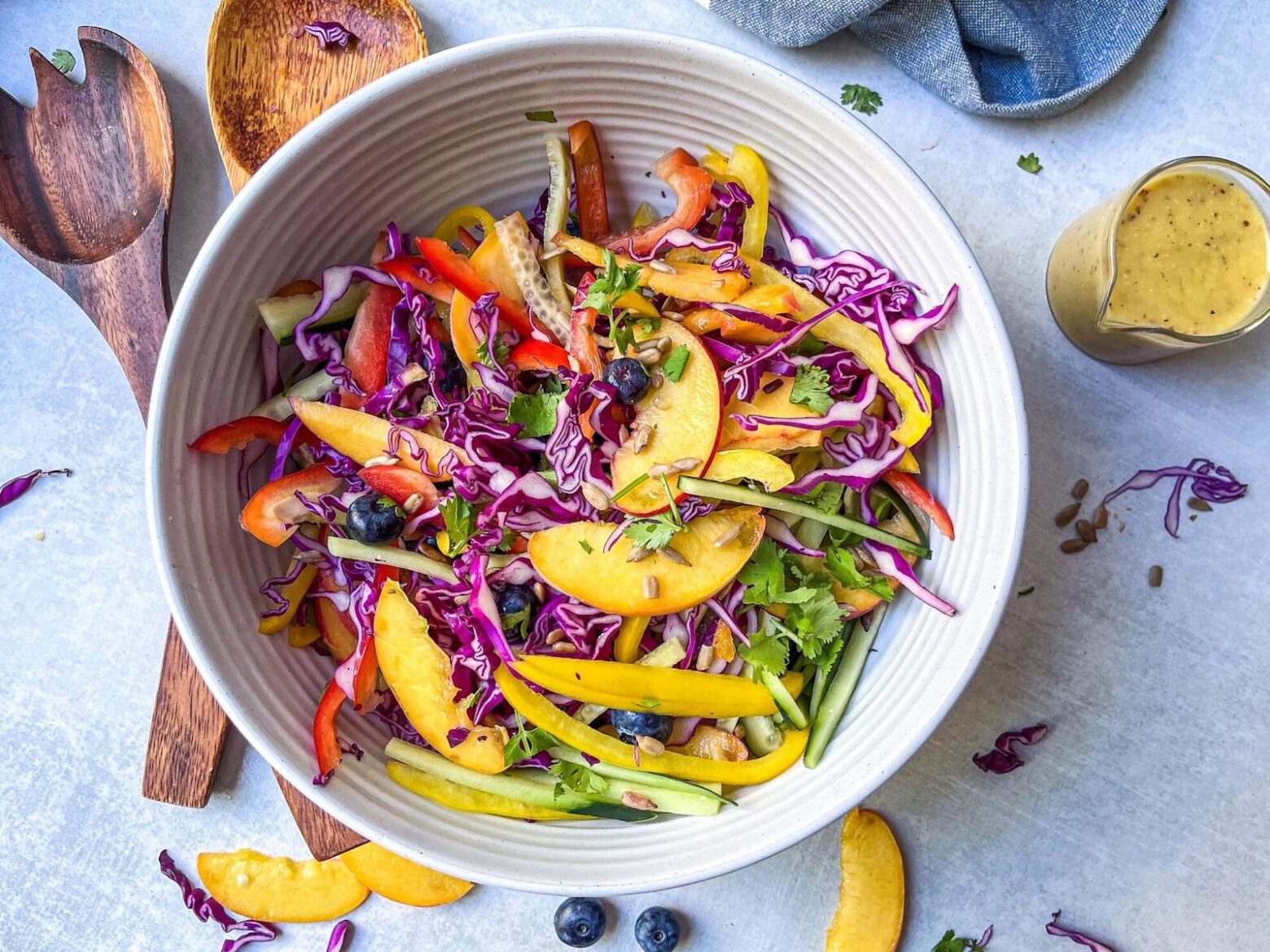 peach & blueberry coleslaw power bowl mixed together