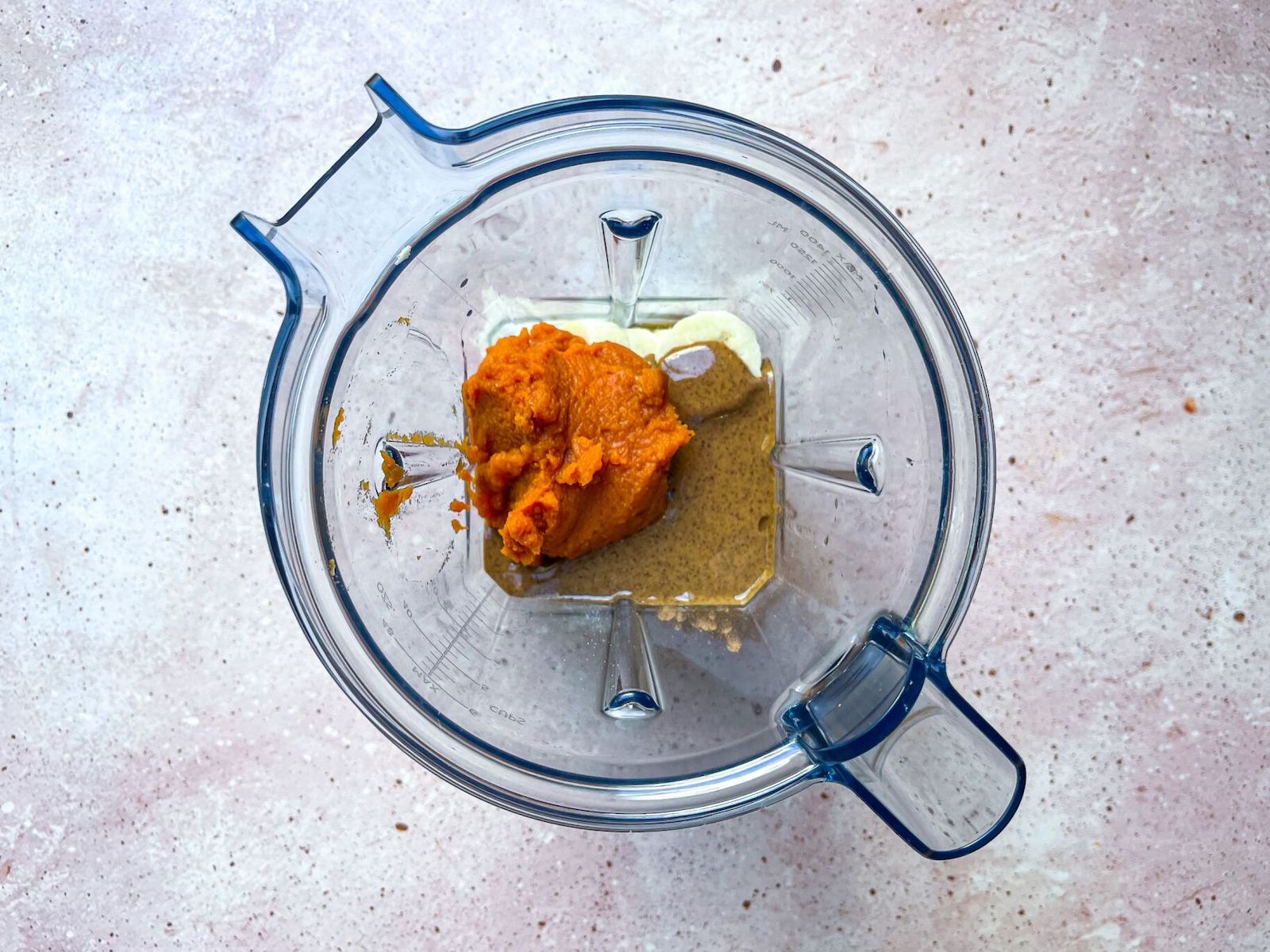 Ingredients for Pumpkin Spice Muffins in a blender