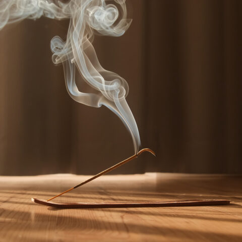 Burning aromatic incense smoky stick for meditation and relaxing.