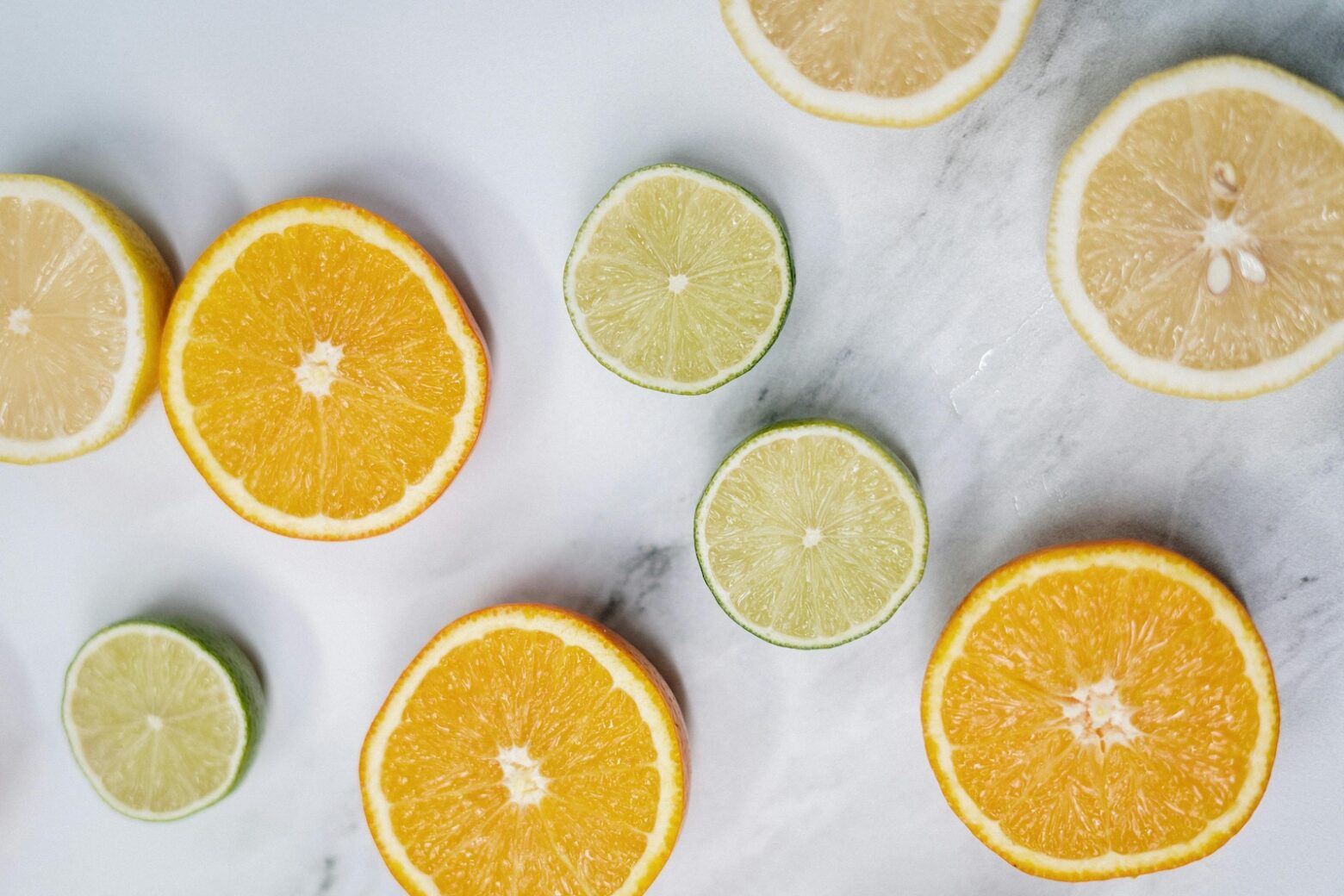 Limes, lemons, and oranges on the countertop