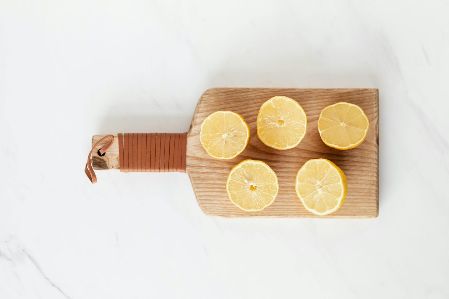 lemon halves on a cutting board