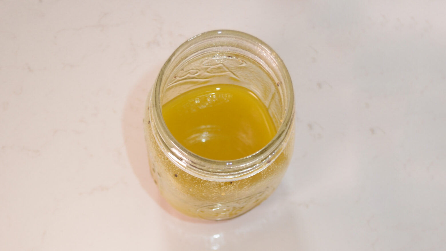 Above shot of vinaigrette in a mason jar