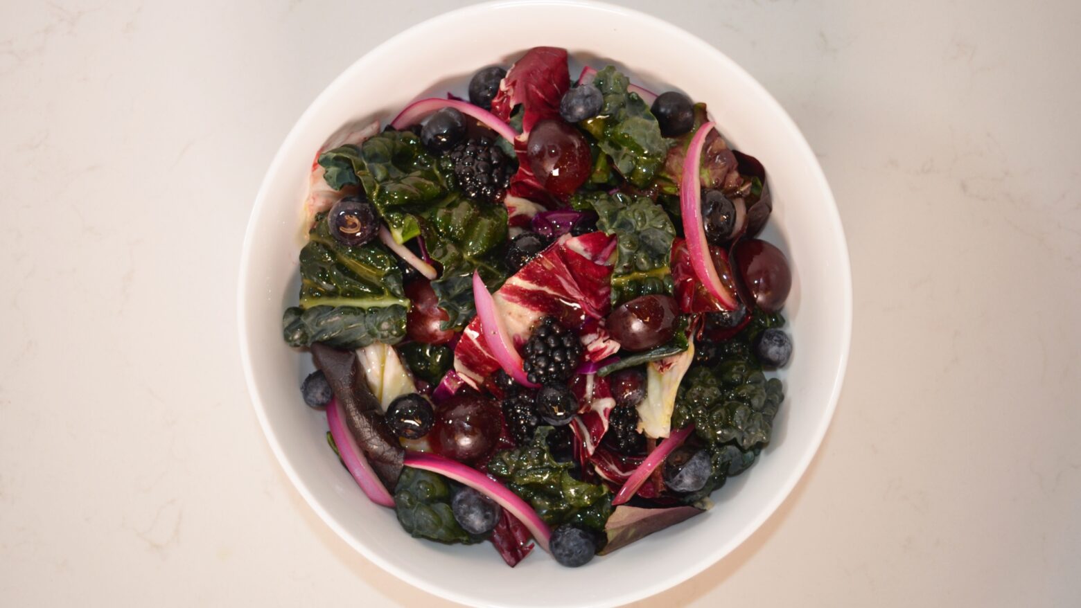 Above shot of a salad with red and purple ingredients