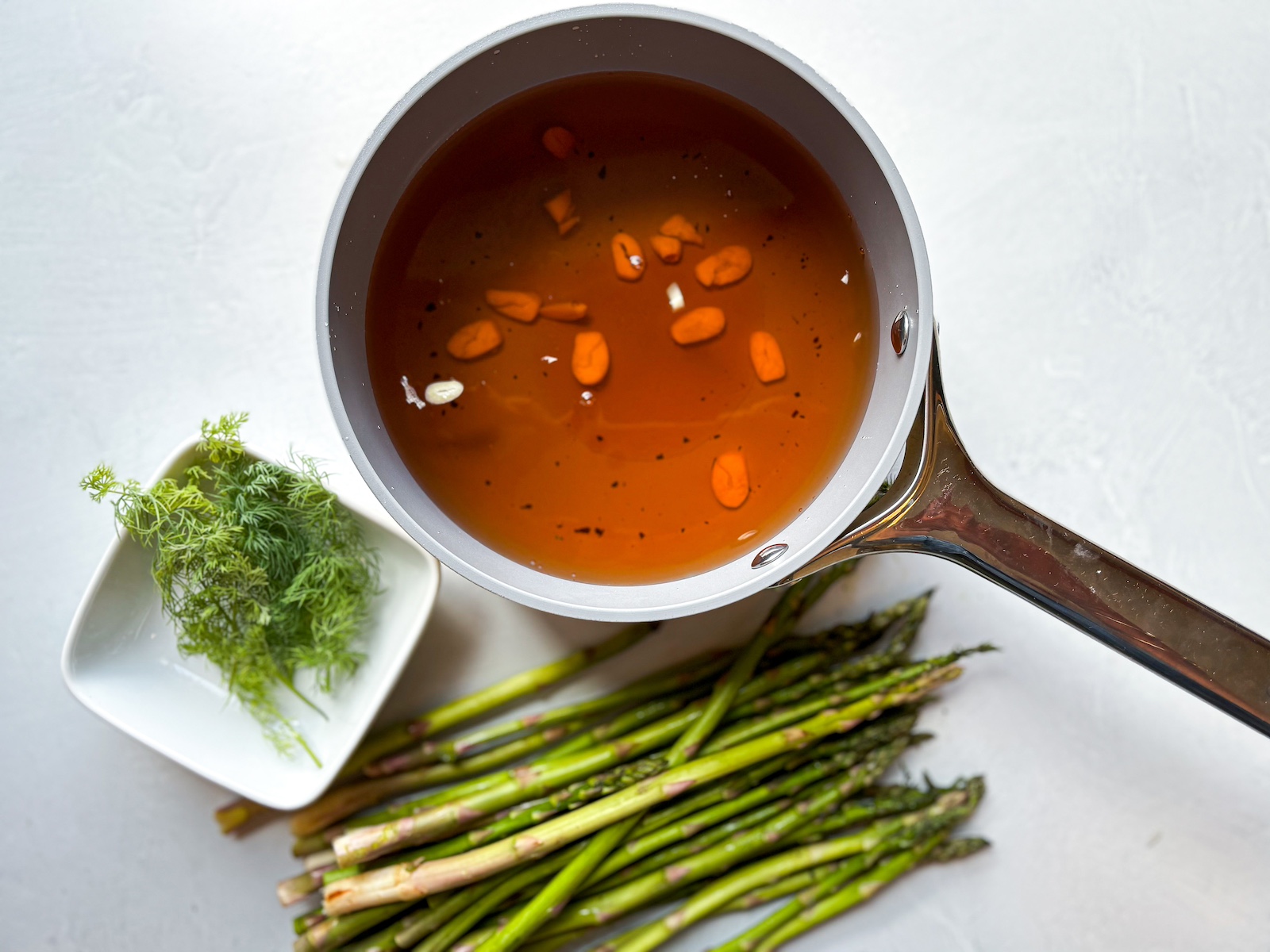 Saucepan heating up pickling marinade.