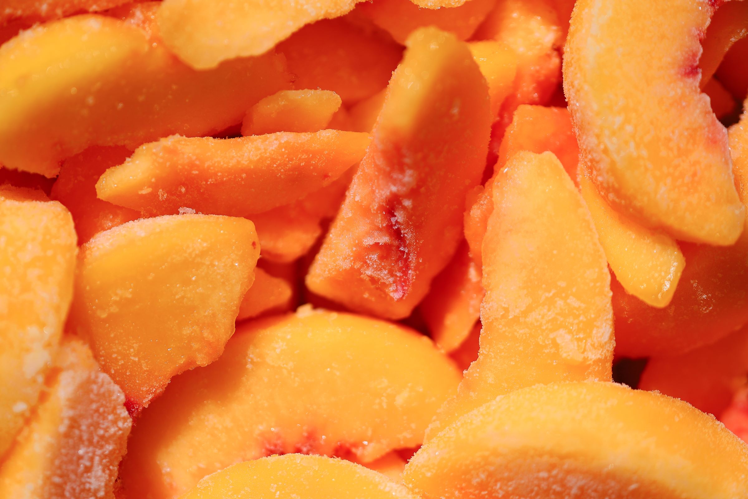 Closeup of frozen slices of peaches