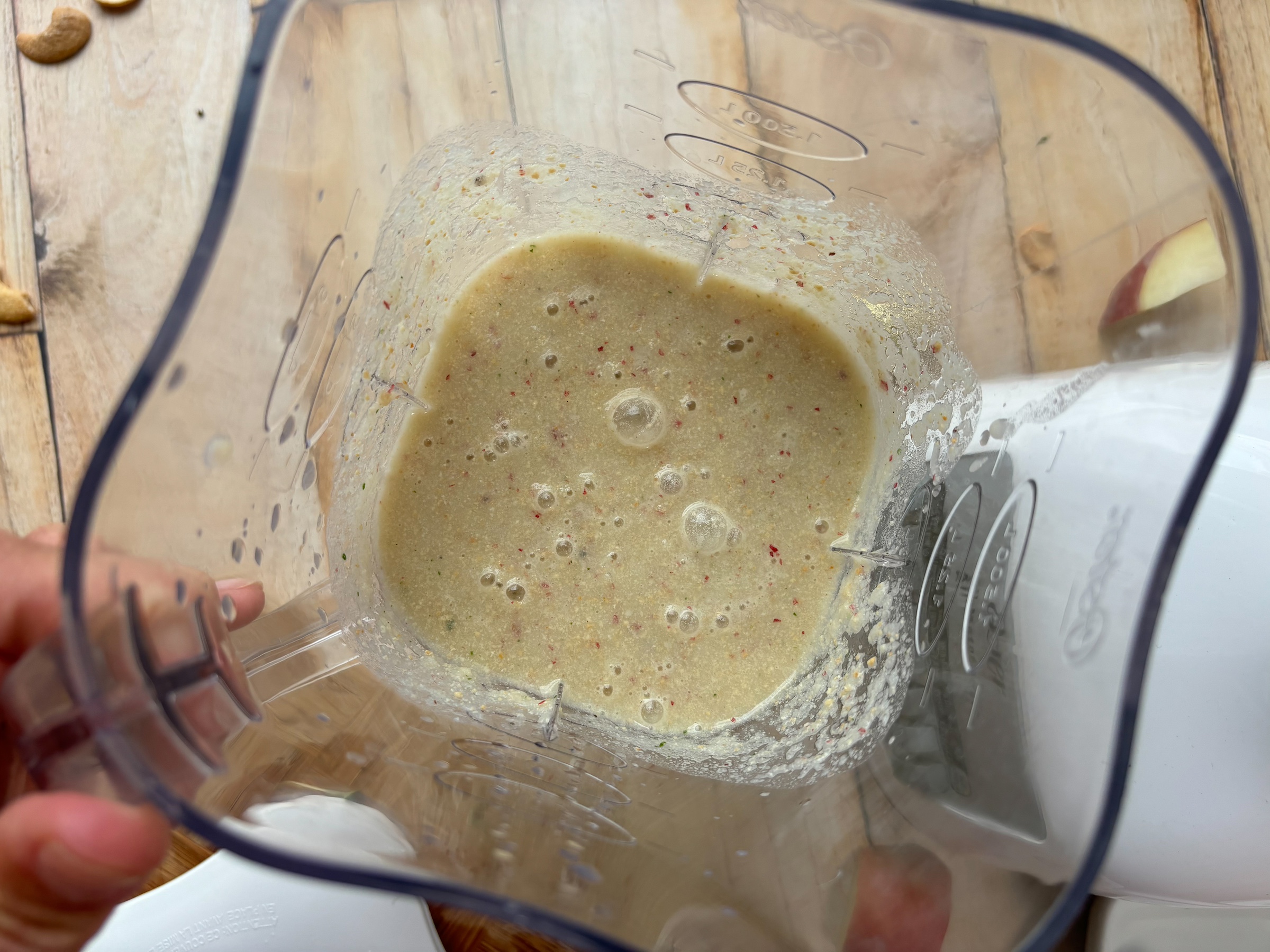 Kale microgreen peach smoothie in a blender