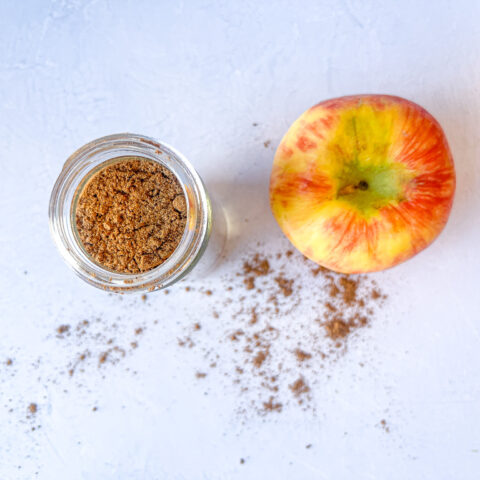 Finished apple pie spice above shot with an apple next to it.