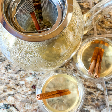 Digestive support tea with two cups and a teapot.